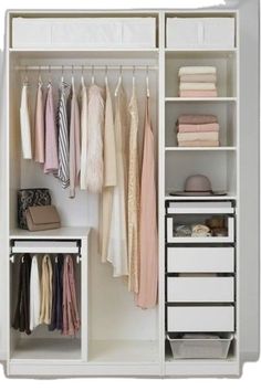 an open closet with clothes and other items