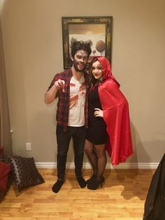 a man and woman dressed up in costumes