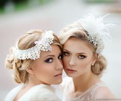 two beautiful women in white dresses are posing for the camera with their heads close to each other