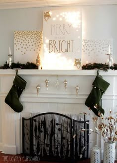 christmas stockings hung on the mantel above a fireplace