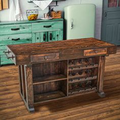 an old fashioned kitchen island made out of wood and metal with drawers on each side