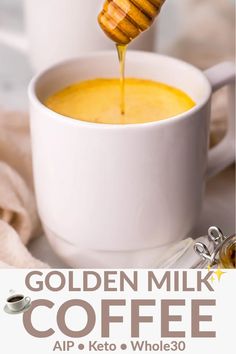 there is a cup of coffee with honey being poured into it and the words golden milk coffee