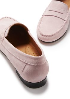 Hugs & Co. ice pink penny loafers for women. Moccasin style loafers in a soft ice pink leather outer and lined with light tan leather for extra comfort. The light weight leather sole achieves a low profile silhouette for this style. Italian Suede Upper Leather sole Natural Tan Leather Lining Traditional Hand Stitching Lightly Padded Insole Made in Portugal Pink Loafers With Leather Sole, Classic Pink Loafers With Leather Sole, Beige Comfortable Slip-on Loafers, Beige Cushioned Slip-on Loafers, Pink Classic Slip-on Loafers, Womens Penny Loafers, Penny Loafer, Moccasins Style, Pink Suede