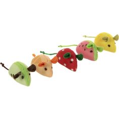 four small stuffed animals hanging from strings