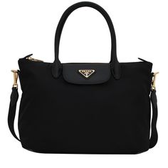 This Prada black shopping tote is classic as well as luxurious. With plenty of room for all your essentials you canÂ pack up and go almost anywhere. Signature gold-tone hardwareÂ is a glamorous contrast toÂ the durable and light-weight nylon. There isÂ also luxurious Saffiano calf leather trim on the bag. Ideal for theÂ sophisticated lady who prefers an understated bag with effortless practicality. There are two leather drop handles for easy carrying as well as a detachable shoulder strap. The b Prada Tessuto Nylon, Sophisticated Lady, Pack Up And Go, Prada Tote Bag, Black Leather Backpack, Crossbody Tote Bag, Black Leather Tote, Prada Handbags, Shopping Tote Bag