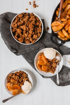 two bowls filled with apple crisp and ice cream