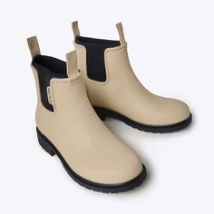 Say hello to Sand! Our first cream coloured boot, long-requested by our Merry community, has landed ashore. This light ‘n' creamy neutral shade is paired with a contrasting deep black neoprene for an effortless and easygoing look, a go-to colourway for all seasons! The perfect everyday rain boot. The Bobbi seamlessly blends fashion and function with natural rubber and a neoprene lining. Our best-selling boots are designed for utmost comfort. Easy to dress up or down, wear from day to night, the Cream Waterproof Round Toe Boots, Cream Waterproof Boots With Round Toe, Casual Cream Outdoor Boots, Beige Waterproof Casual Boots, Cream Round Toe Boots For Outdoor, Cream Round Toe Outdoor Boots, Beige Ankle-high Boots For Outdoor, Casual Cream Boots With Rubber Sole, Casual Beige Waterproof Boots