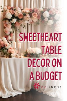 a table with flowers and candles on it that says sweetheart table decor on a budget