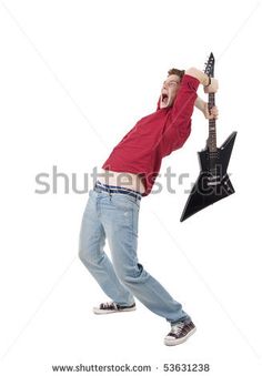 a young man holding an electric guitar and screaming