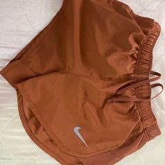 Nike Orange Womens Running Dri Fit Shorts Never Worn Size Extra Small Sporty Brown Shorts For Spring, Nike Brown Sports Bottoms, Nike Orange, Womens Running, Shorts Nike, Shorts Athletic, Nike Shorts, Running Women, Athletic Shorts