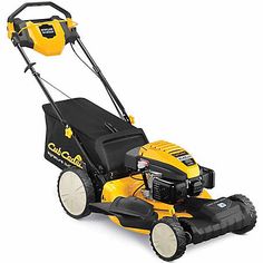 a yellow and black lawn mower on a white background