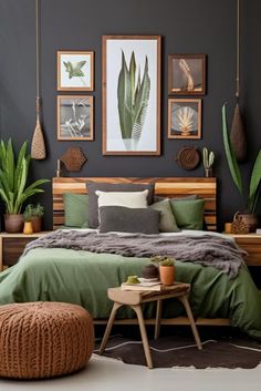 a bedroom with green bedding and pictures on the wall