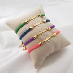 𝐻𝑜𝓌 𝒯𝑜 𝒪𝓇𝒹𝑒𝓇 - Choose Cord Color. 𝐼𝓉𝑒𝓂 𝒟𝑒𝓈𝒸𝓇𝒾𝓅𝓉𝒾𝑜𝓃 Cross Bracelet. Bracelet length: adjustable up to 7". 𝒪𝓇𝒹𝑒𝓇 𝐻𝒶𝓃𝒹𝓁𝒾𝓃𝑔 𝒯𝒾𝓂𝑒 Order processing time for our items is 3-5 business days, please note it does not include the delivery time. All of our jewelry is handmade with Love ❤ 𝒟𝑒𝓁𝒾𝓋𝑒𝓇𝓎 𝒯𝒾𝓂𝑒 US ORDERS: Free First Class Mail by USPS - 5-7 business days  -or- Expedited Shipping by DHL - 1-3 business days for 19.90 USD. INTERNATIONAL ORDERS: UK/GE Pink Cross Bracelet For Gift, Blue Cross Bracelets As Gift, Pink Cross Bracelet For Gifts, Adjustable Cross-shaped Friendship Bracelets As Gifts, Gold Cross-shaped Beaded Bracelets For Gifts, Jesus Gifts, Jewelry Cross, Custom Cross, Figaro Chains