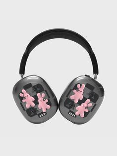 the headphones are decorated with pink and black cartoon headset designs on it's ears