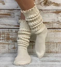 "SCRUNCHY lace ULTIMATE slouch socks - natural Slouch socks with lace top? Yes, please! Fall head over heels for our new lux cotton slouch socks! This scrumptious beige lace slouch sock is seriously soft with a natural lace trim. The absolute best way to describe this dreamy beige lace slouch sock? Super-duper-thick-cuddly-cotton-cozy-lovable-sock-itude!  Our exclusive sock, you will not find this quality sock anywhere else! 90% cotton.10% nylon fits  adult  shoe size 6-9 made in america  sock i Cream Fitted Cozy Socks, Comfortable Cream Socks, Cozy Fitted Cream Socks, Comfortable Fitted Cream Socks, Fitted Cozy Beige Socks, Fitted Beige Cozy Socks, Fitted Beige Socks For Spring, Soft Cream Socks For Fall, Socks With Lace