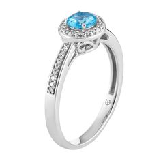 Adorned with a round-cut Swiss blue topaz center stone framed with dazzling diamonds, this 10k white gold halo ring captivates from every angle.RING DETAILSWidth: 8.40 mmMetal: 10k white goldPlating: rhodiumFinish: polishedPackaging: boxedSTONE DETAILSStone type: Swiss blue topazTotal weight: 5/8 ct.Center stone size: 6 mm x 4 mmShape: roundSetting: prongDIAMOND DETAILSTotal weight: 1/6 ct.Color grade: I-JClarity: I2-I3Shape: roundSetting: prongGemstones may have been treated to enhance their ap White Gold Diamond Ring With Brilliant Cut Blue Topaz, White Gold Topaz Ring With Diamond Accent Stones, 14k White Gold Topaz Ring With Center Stone, Fine Jewelry Blue Topaz Diamond Ring With Center Stone, Diamond Topaz Birthstone Ring With Round Stone, Fine Jewelry Blue Topaz Birthstone Ring With Diamond Accents, Blue Topaz Birthstone Ring With Diamond Accents, Topaz Birthstone Ring With Diamond, Classic Diamond Topaz Ring With Halo Design