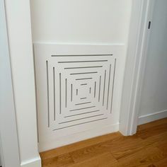 the door is open and there are lines on the wall