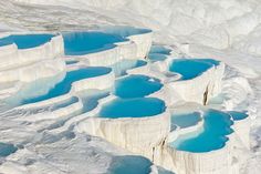 the ice formations are blue and white in color