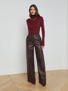 The L’AGENCE favorite straight-leg trouser, fitted through the hips and relaxed through the leg. Reinvented each season in fresh prints and fabrications. • 100% lambskin leather• High-rise wide straight-leg• Side slant pockets• Back welt pockets• Hidden hook-and-bar closure | L'AGENCE Livvy Leather Trouser In Dark Syrah Leather Trousers Outfit, Fall Clothing, Early Fall Outfit, Interview Outfit, Trendy Fall, Leather Trousers, Fall Collection, Straight Leg Trousers, Casual Dinner Outfit