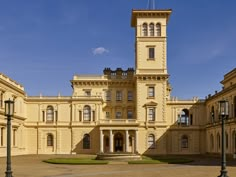 an old building with a clock tower in the middle