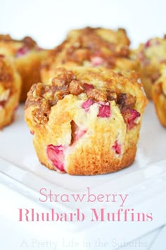 strawberry rhubarb muffins on a white plate