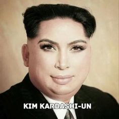 an old photo of kim kardash - i - un wearing a suit and tie