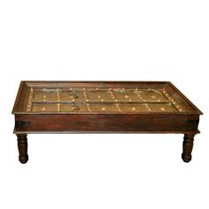 an old wooden coffee table with lights on it's top and bottom shelf,