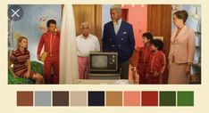 an image of people standing in front of a tv set with color swatches on it