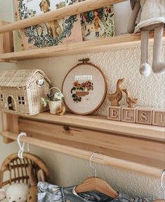 a wooden shelf filled with different types of items on top of it's shelves