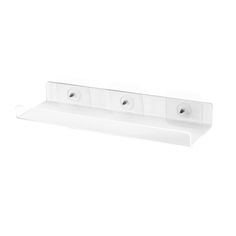 two white shelves with three holes on each side and one shelf below the wall for storing items