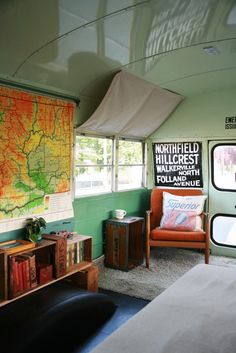 a bedroom with a map on the wall