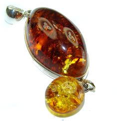 Handmade Unique 925 Sterling Silver pendant with unique one of a kind Amber,  11.80 grams of marvelous handcrafted jewelry design. Only one piece availble ready to ship! It's unique worldwide pendant - simply piece of art in world of fine jewelry. Vintage Beauty authentic Baltic Amber  .925 Sterling Silver handcrafted pendant  PENDANT DETAILS: Weight: 11.80g; Material: Sterling Silver; Main stone: Amber; Dimension: L- 2 7/8, W - 7/8, T - 3/4 inch; Inner Bail Diameter: 1/4 inch; Stamp / Mark: 925; Condition: New; Main color: brown; Shape: oval; Collection: Polish;  Item Code: 9-wrz-24-8 Luxury Amber Sterling Silver Necklace, Luxury Amber Necklaces With Large Pendant, Luxury Baltic Amber Pendant Necklace, Luxury Amber Necklace With Large Pendant, Jewelry Online Store, Jewelry Education, Hot Jewelry, Zodiac Pendant, Emerald Pendant