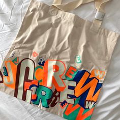 J. Crew Canvas Shopping Bag. Only Printed With “J. Crew” Letters On One Side The Other Side Is Blank. Never Used! Orange Canvas Shopping Bag, Orange Cotton Shopping Bag, Canvas Shopping Bag, The Other Side, Canvas Bag, Womens Tote Bags, Tee Shirt, J Crew, Tee Shirts