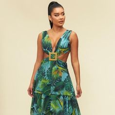 West Palm Maxi Tiered Cut Out Tropical Print Dress. Perfect For Vacation Tropical Print V-neck Midi Dress For Garden Party, Chic V-neck Midi Dress With Tropical Print, Tropical V-neck Party Dress, Chic Cutout Dresses For Vacation, Vacation Midi Dress With Cutout Details, Green V-neck Tropical Mini Dress, Vacation Cutout Midi Dress, Beach Midi Dress With Cutout, V-neck Tropical Print Party Dress