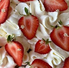 strawberries and whipped cream arranged on top of each other