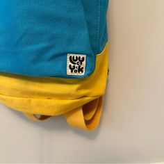 Draw String Backpack With Adjustable Straps & A Flap Cover. Also Has A Front Pocket. Never Used. Not Sold Anymore On The Lucy And Yak Site!! Perfect Condition. Casual Yellow Softback Bag, Blue Cotton Backpack For Daily Use, Casual Yellow Backpack For Daily Use, Blue Cotton Backpack For Travel, Blue Canvas School Backpack, Casual Yellow Backpack, Yellow Softback Backpack For Back To School, Blue Canvas Backpack For Back To School, Blue Canvas Bags For Back To School