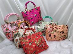 Wholesale Lot Of 100 Indian Handmade Women's Embroidered Handbag, Wedding Favor, Return Gift, Birthday Gift, Bridesmaid Gifts PRODUCT DETAIL :- -------------------------- Product Item : Assorted Colors Handbags Product Line: Rajasthani Ethnic Women Handbag Potli Bags Material -: Fabrics, Beads , Hand Embroidery Occasion: Any Occasion, Festive, Party, Wedding, Bridal PRODUCT DESCRIPTION :- This colorful Clutch Purse with vibrant colors & ethnically designed is a specialty from Rajasthan artisans. Pink Wedding Bag With Dori Work, Pink Zari Work Bag For Reception, Multicolor Embroidered Bags For Wedding, Multicolor Bags For Reception And Festivals, Multicolor Embroidered Bags For Weddings And Festivals, Multicolor Rectangular Bag For Receptions, Multicolor Bags For Festivals And Receptions, Multicolor Handwork Wedding Bag, Multicolor Handwork Bags For Wedding