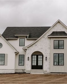 a large white house with two story windows