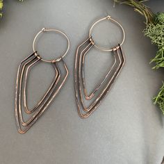 Hand formed, hammered and oxidized copper dangly hoops. This design comes with rose gold hoops so they are great for anyone with sensitive ears. These have such amazing movement and are so light and versatile. These earrings are made to order, so please expect some variations in small details of the stone, oxidation, and metalwork. Although I make a lot of effort to keep each piece true to the original design. Hand Forged Copper Hoop Earrings With Dangle, Hand Forged Copper Dangle Hoop Earrings, Unique Small Hoop Copper Earrings, Beaded Stacking Rings, Earthy Earrings, Silver Bar Earrings, Dot Ring, Stick Earrings, Oxidized Copper