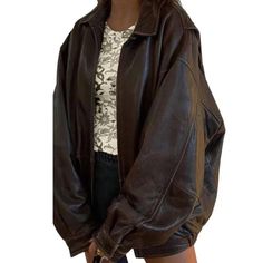 Women's Oversized Vintage Jacket | Handmade 90's Brown Bomber Leather Jacket | Biker Jacket Indulge in a fusion of retro charm and modern edge with our Women's Oversized Vintage Jacket, a handmade 90's Brown Bomber Leather Jacket that encapsulates the essence of vintage allure and contemporary style. Crafted with meticulous care and expertise, this jacket is a timeless piece designed to transcend fashion eras. Made from premium brown leather, it boasts a 90's-inspired bomber silhouette, exuding effortless coolness and urban chic. The oversized fit adds a contemporary twist to the classic bomber jacket, ensuring both comfort and a fashion-forward look. The brown hue complements the vintage aesthetic while offering versatility to effortlessly pair with various outfits. Embracing the essence Wishlist 2024, Baggy Style, Women Overcoat, Real Leather Jacket, Retro Mode, Brown Leather Jacket, Brown Jacket, Leather Jackets Women, Vintage Jacket