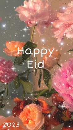 a happy eid with pink flowers and sparkles in the sky above it is an image that says, happy eid