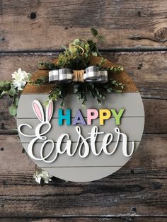 a sign that says happy easter hanging on the side of a wooden wall with flowers