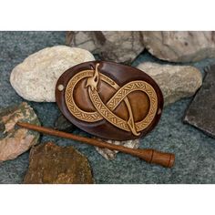 We present you this beautiful barrette with ornament viking serpent jormungand. Hand crafted of natural leather and wooden stick.This design is dedicated for not specially thick hair. Remember that the item is handmade, it means it may be slightly different from the picture.Add magic to yor life! Viking Serpent, Viking Leather Hair Wrap, Vikings Leather Earrings, Viking Leatherwork, Hand Carved Wooden Hair Pins, Viking Brooch, Dragon Riders, Viking Hair, Dragon Rider