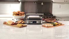 a counter top with food on it and an appliance sitting next to it