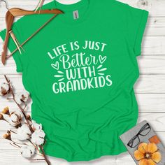 a green shirt that says life is just better with grandkids