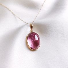 This stunning pendant is set in 14k Solid Yellow Gold with Natural Pink Tourmaline with utmost precision. It is an unique gemstone pendant for nearly every occasion and is completely hassle-free jewelry. 🔷 ABOUT GEMSTONE: Pink Tourmaline is a stunning gemstone, cherished for its soft pink hues that embody love, compassion, and emotional healing. Known as a stone of the heart, Pink Tourmaline is believed to promote feelings of joy, acceptance, and emotional balance, making it an excellent choice Oval Tourmaline Gemstones As Gifts, Oval Tourmaline Necklace Fine Jewelry, Oval Tourmaline Necklace In Fine Jewelry Style, Tourmaline Gemstone Oval Pendant Jewelry, Oval Tourmaline Birthstone Jewelry, Handmade Jewelry Box, Tourmaline Pendant, Tourmaline Jewelry, Bezel Pendant