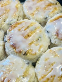 glazed biscuits with icing sitting in a pan