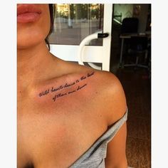 a woman with a tattoo on her shoulder that says, what hearts have't the best of them now