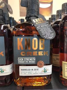 bottles of knob creek cask strength sit on display