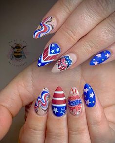 This set showcases an eclectic mix of designs, from wavy patterns to classic USA nails almond shapes featuring the flag. The whimsical approach to the iconic red, white, and blue uses marbling techniques and cartoon-like illustrations, making each nail a piece of art. The varied designs celebrate 4th of July with flair and creativity Unique 4th Of July Nails, Marbling Techniques, Patriotic Art, Holiday Nail Designs